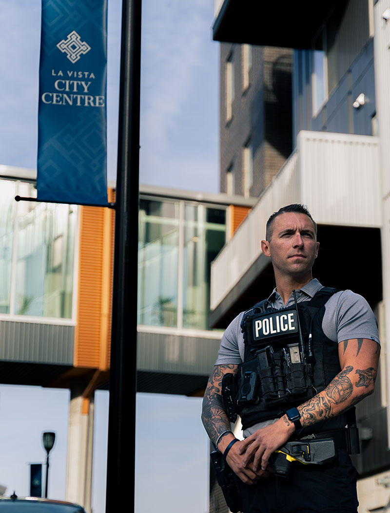 security guard standing outside of building