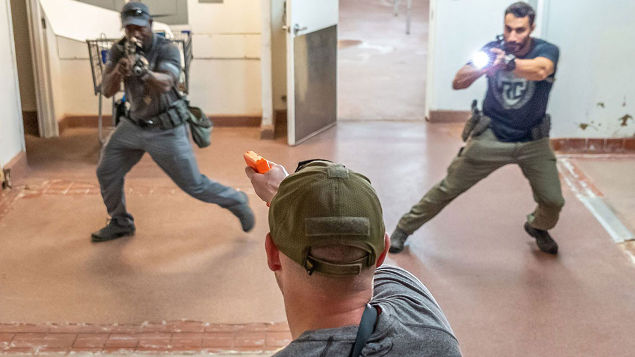 three males participating in cqc high threat training course